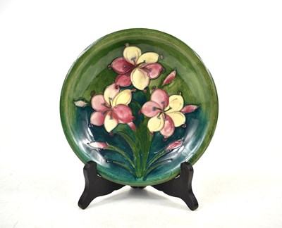 Lot 16 - A Moorcroft dish in the freesia pattern,...