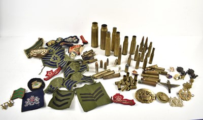 Lot 154 - A group of militaria to include a British Army...