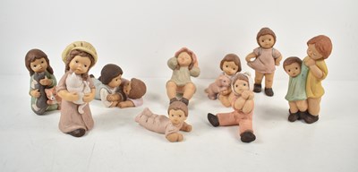 Lot 18 - A group of Goebel Nina and Marco figurines,...