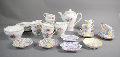 Lot 32 - A group of Shelley porcelain to include cups,...