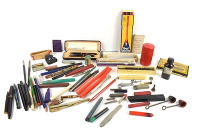 Lot 99 - A group of collectables to include pen nibs,...
