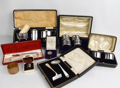 Lot 23 - A collection of silver to include a condiment...