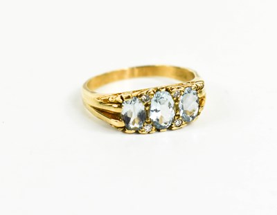 Lot 138 - A 9ct gold, aquamarine and diamond ring, the...