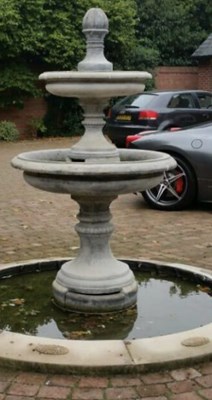 Lot 321 - A reconstituted stone 20th century two tier...