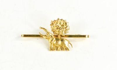 Lot 19 - An 18ct gold bar brooch, in the form of an...