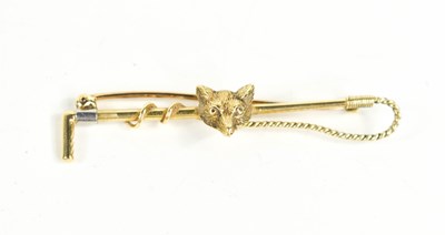 Lot 103 - A 9ct gold tie pin in the form of a hunting...