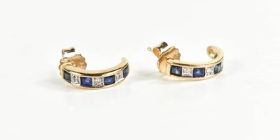 Lot 51 - A pair of 9ct gold half hoop diamond and...