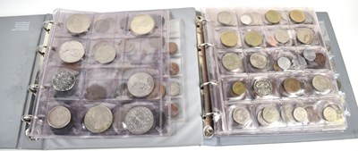 Lot 222 - Two albums of GB and worldwide coins to...