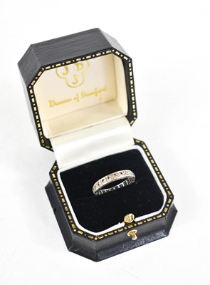 Lot 20 - An 18ct white gold and diamond full hoop...