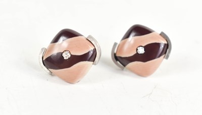 Lot 136 - A pair of diamond and zebra rock stud earrings...