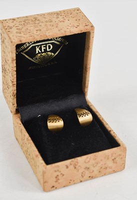 Lot 50 - A pair of 18ct gold stud earrings, of...
