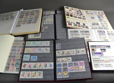 Lot 196 - A group of nine stamp and stock albums...