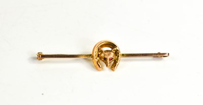 Lot 64 - A 9ct gold bar brooch, with fox and horse shoe...