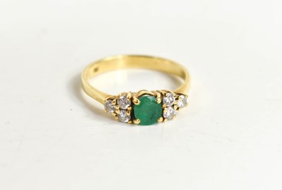 Lot 74 - An 18ct gold, emerald and diamond ring, the...