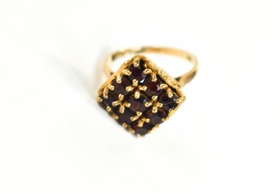 Lot 72 - A 9ct gold and garnet cluster ring, the...