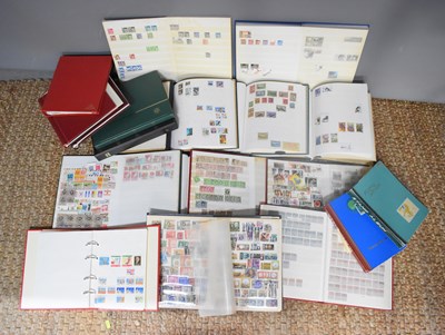 Lot 200 - A group of twenty stamp albums and stock books,...