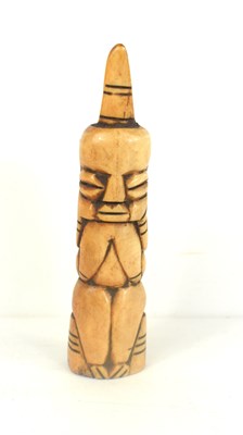 Lot 108 - An African carved bone figure, 13cm high.