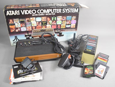 Lot 372 - A vintage Atari CX-2600 video computer system,...