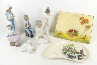 Lot 39 - A group of six Lladro Nao porcelain figurines...