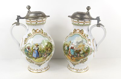 Lot 40 - A Pair of German porcelain beer steins by...