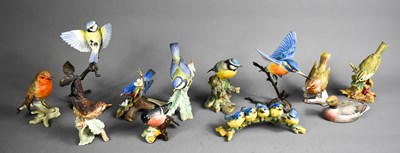 Lot 45 - A selection of porcelain birds to include a...