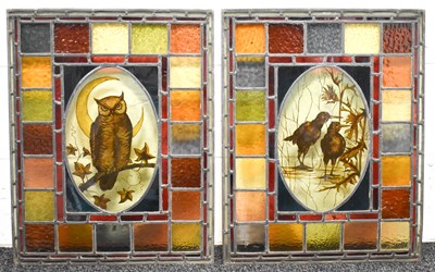Lot 26 - Two antique stained glass panels, the central...
