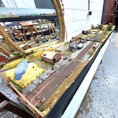 Lot 461 - A large OO gauge model railway layout of...