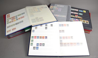 Lot 202 - A group of seven stamp albums and stock books...