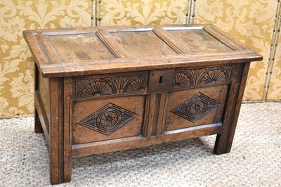 Lot 336 - An 18th century oak coffer of small...