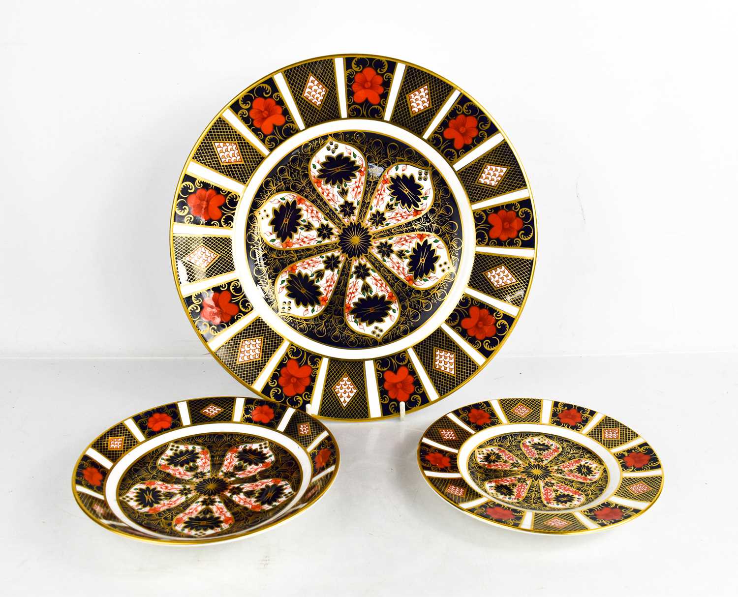 Lot 168 - Three Royal Crown Derby plates, in the Old...