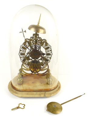 Lot 229 - A late 19th century brass skeleton clock, the...