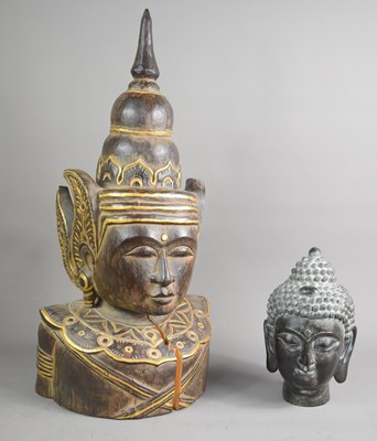 Lot 264 - A 20th century carved Indonesian carved bust...