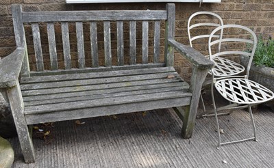 Lot 341 - A wooden garden bench together with two...