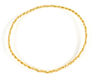 Lot 249 - A gold ropetwist bangle, 6.5cm internal...