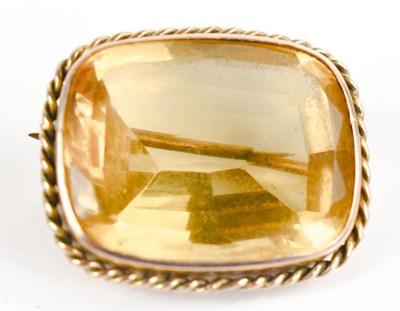 Lot 13 - An antique gold and citrine brooch, 2cm by...