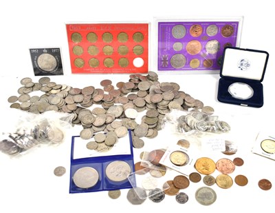 Lot 143 - A group of coins to include a 1oz silver...