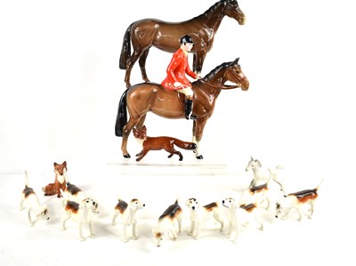 Lot 82 - A Beswick horse, hound and fox hunt set,...