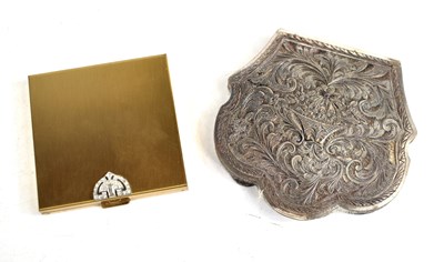 Lot 152 - A vintage gold tone Volupte powder compact...