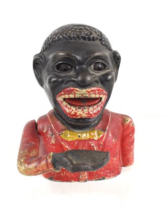 Lot 214 - A cast iron novelty blackamoor money bank.