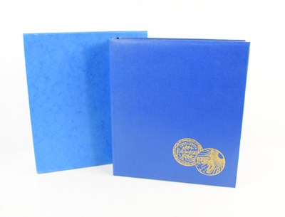 Lot 145 - An album containing various coins to include...