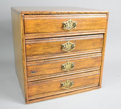 Lot 260 - An antique oak four drawer table top...