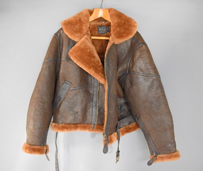 Lot 354 - A Mil-Tec brown leather bomber jacket, label...
