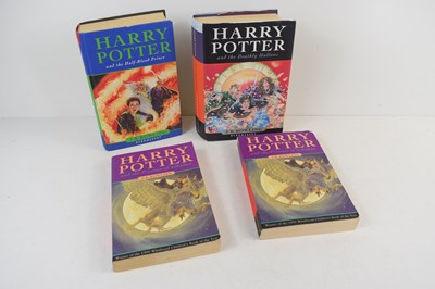 Lot 300 - Harry Potter by JK Rowling, four books to...