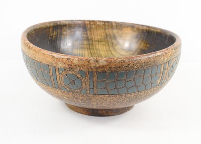 Lot 92 - A hand turned wooden fruit bowl with green...
