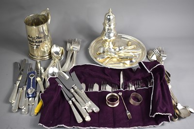 Lot 107 - A silver sugar sifter, London 1939, together...