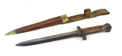 Lot 220 - A WWII standard issue bayonet with leather...