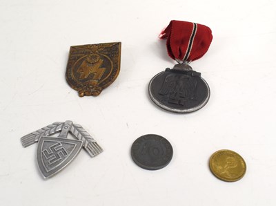 Lot 230 - A group of German militaria, to include...