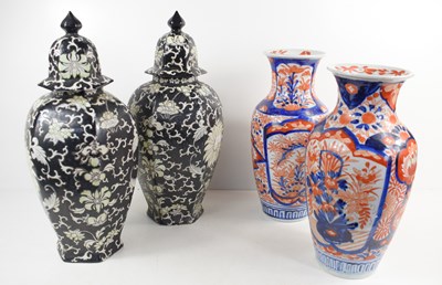 Lot 79 - A pair of early 20th century black glazed...
