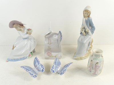 Lot 81 - A group of Lladro and Nao porcelain figures to...