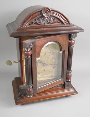 Lot 122 - An antique German walnut cased chiming bracket...